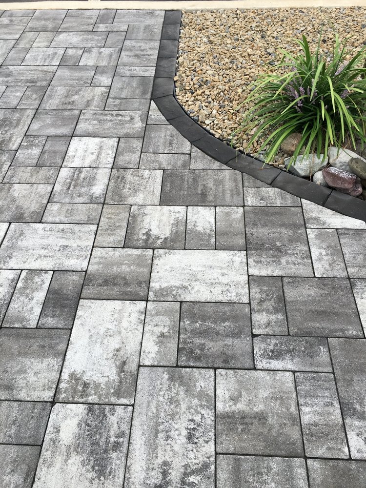 Paver,Installed,Black,And,White,In,Backyard